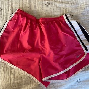 Pink Nike running shorts